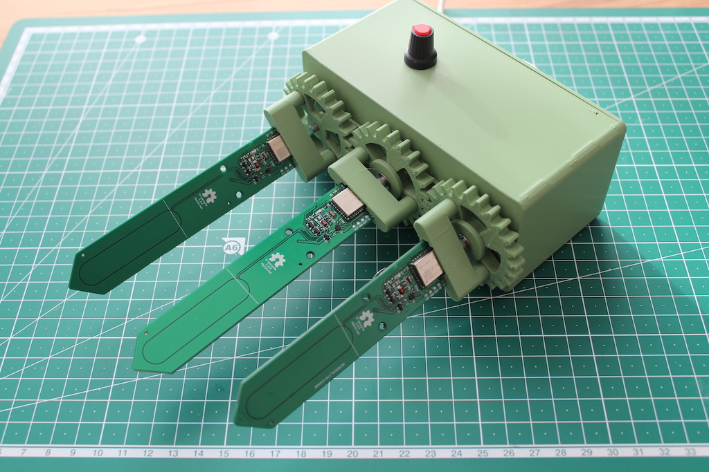 Photo of the rotisserie with three b-parasites attached